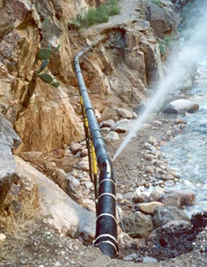 A gush of water spews out of a broken pipeline near Phantom Ranch//NPS Photo