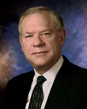 headshot of telecommunications fiber optic pioneer, James Q. Crowe